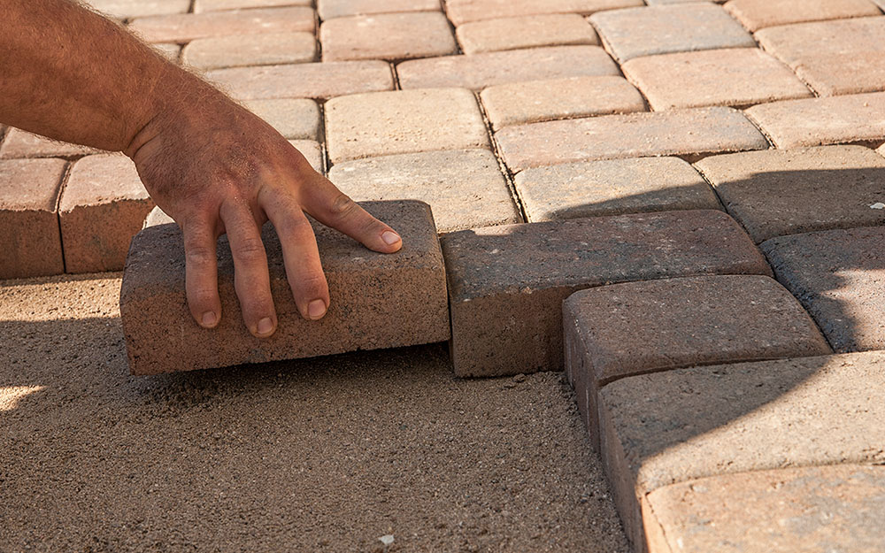 Laying paving blocks for driveway