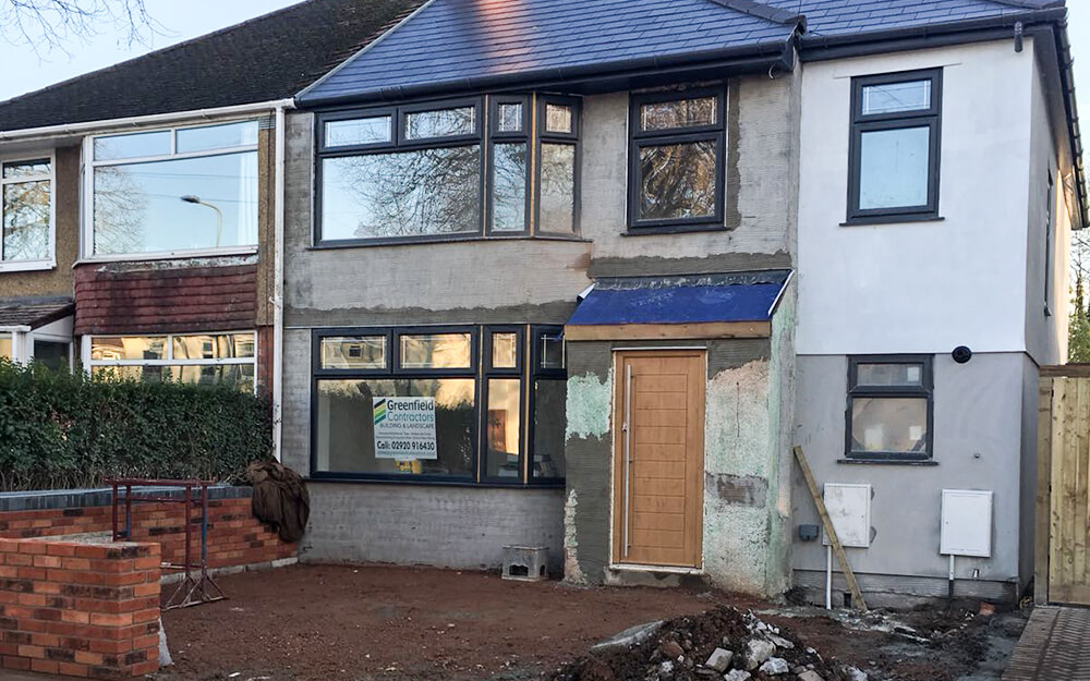 Two-storey extension built without external render